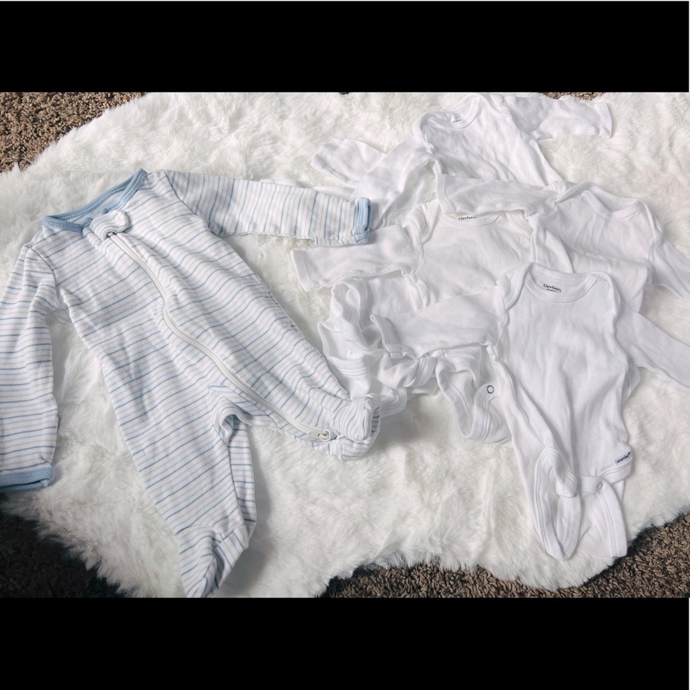 Gerber newborn onesies and a newborn carters sleeper